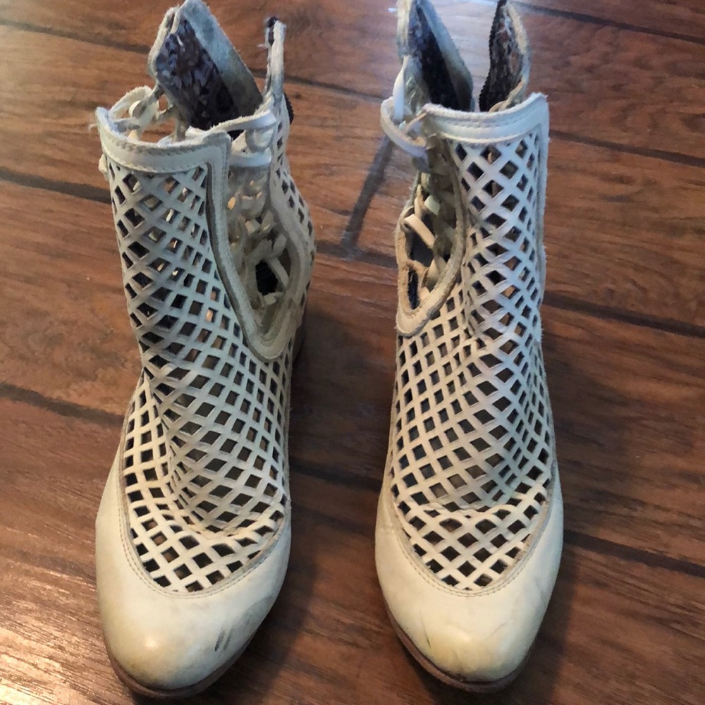 Freebird white leather ankle boots.